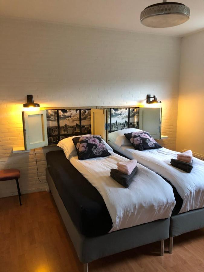 Gastenverblijf Door De Poort ติลเบิร์ก ภายนอก รูปภาพ